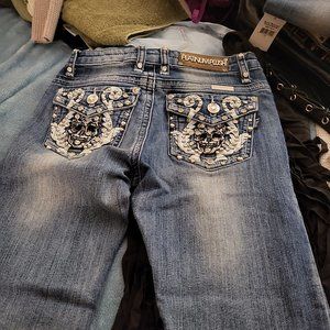 Rock  Revival and platinum  plush  jeans along with my leather vest and boostiea